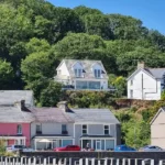 What Is the Geographical and Administrative Context of Borth y Gest North Wales