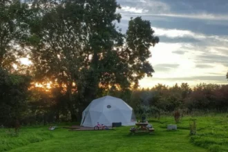 What is the historical background of glamping North Wales infrastructure