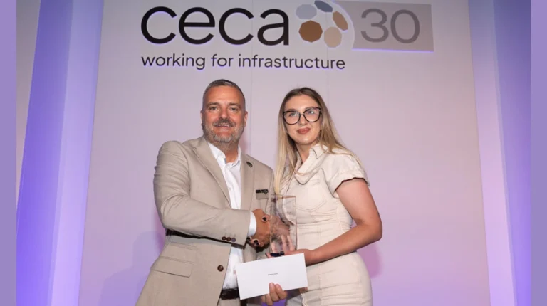 Gabriela receives the award from CECA Southern Chair, Kevin Valentine.
