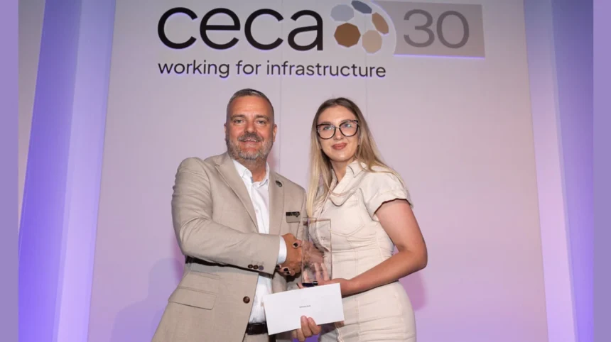 Gabriela receives the award from CECA Southern Chair, Kevin Valentine.