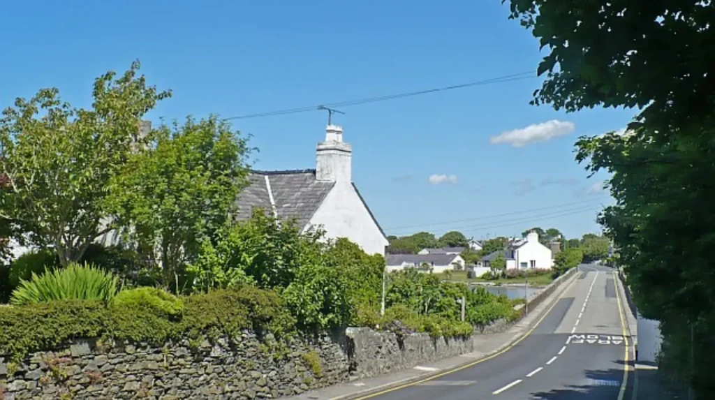 What is the geographical and historical significance of Rhoscolyn Anglesey Wales?
