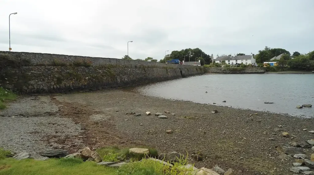 What is the geographical and historical significance of Rhoscolyn Anglesey Wales?