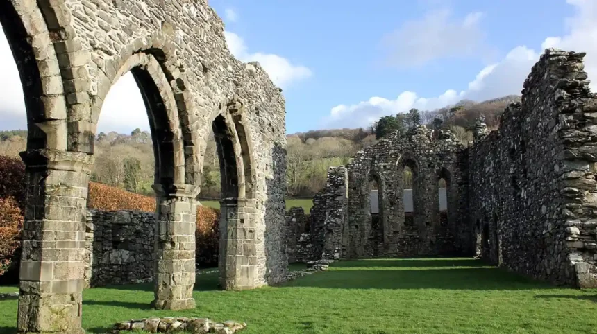 What Is the Historical and Architectural Significance of Cymer Abbey in Wales