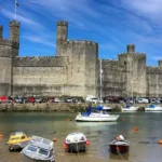 What Is the History and Architecture of Caernarfon Castle in Wales
