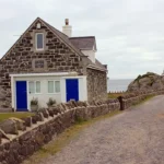 What is the geographical and historical significance of Rhoscolyn Anglesey Wales